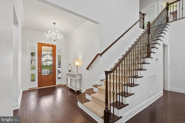 a view of living room with furniture and rug