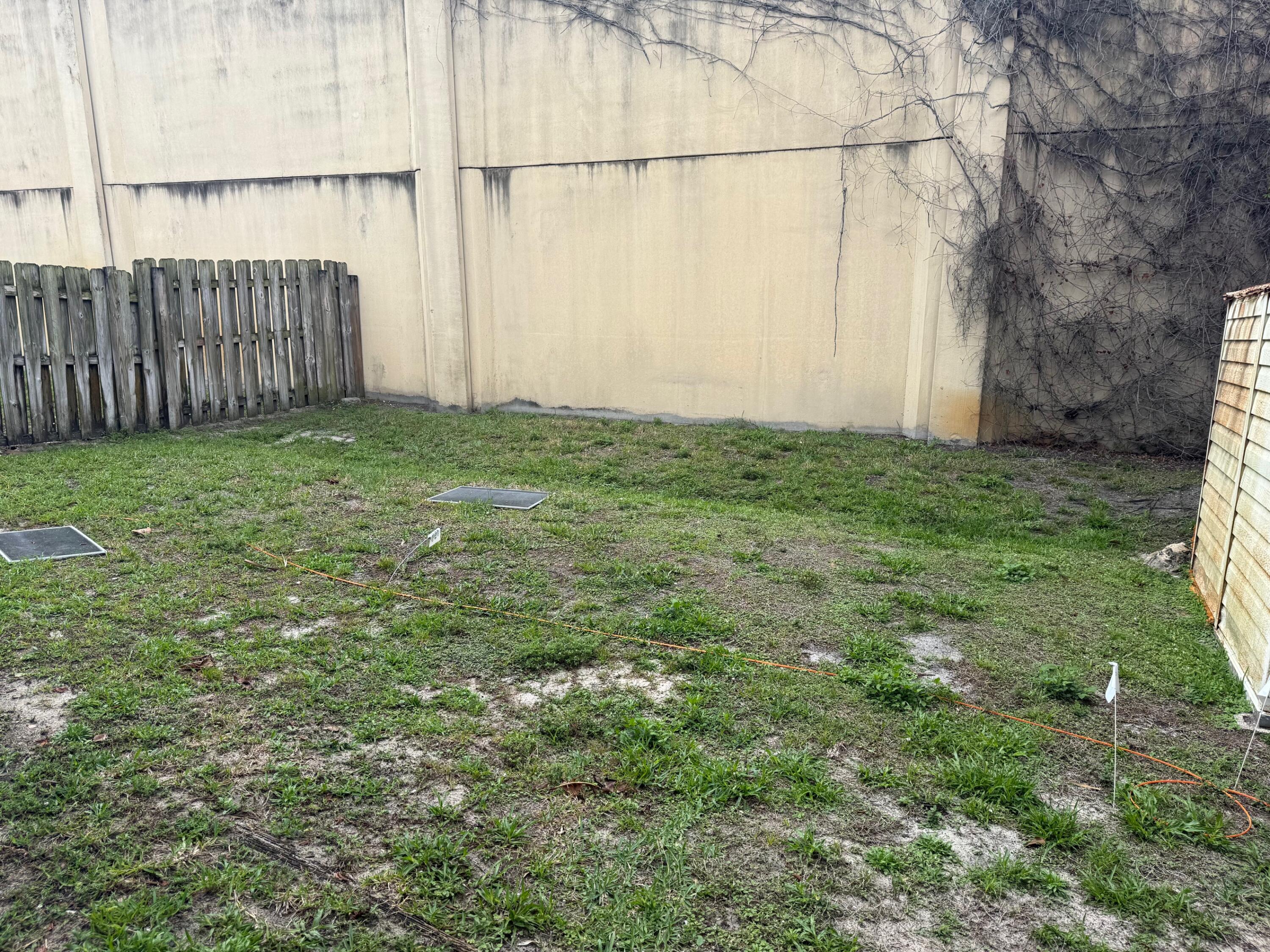 6257 Kendrick Street, Unit 2 Jupiter, FL 33458 - Photo 10 of 11 a view of a backyard