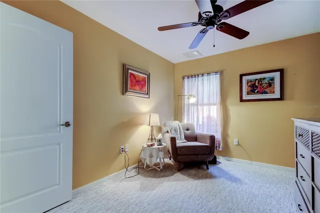 a bedroom with furniture and a bed