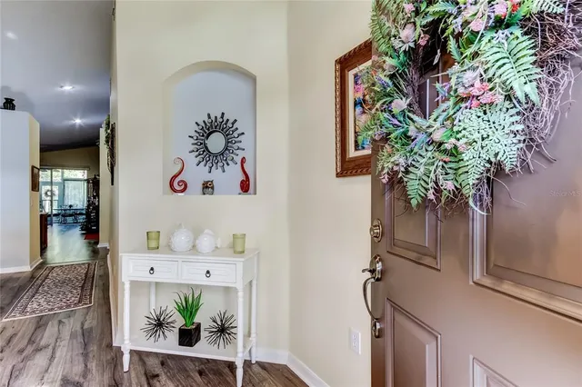 a kitchen that has a lot of cabinets a sink and a stove in it