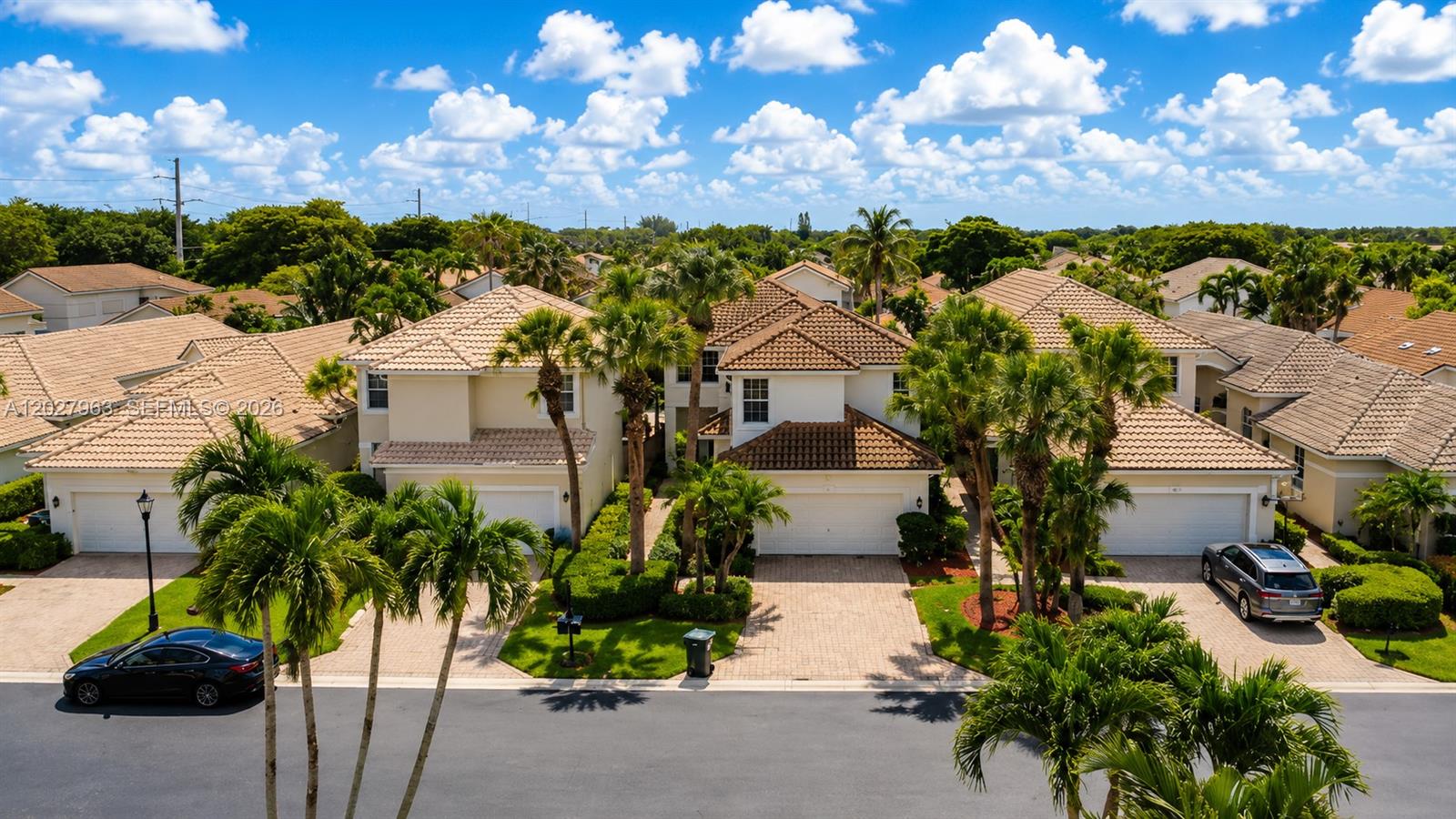 6646 Northwest 25th Terrace Boca Raton, FL 33496 - Photo 48 of 48 a view of a house with a yard and garden