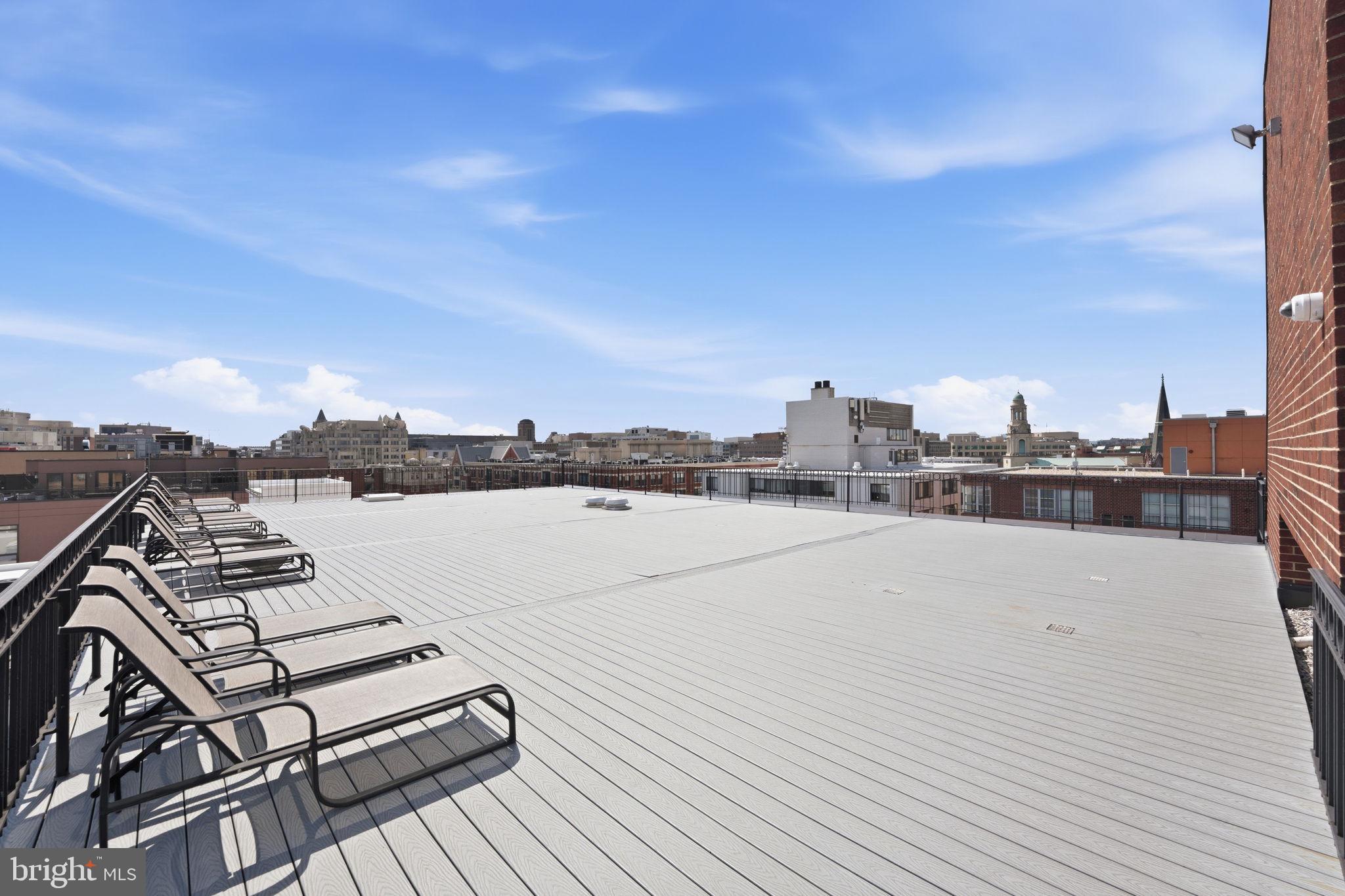 1245 13th Street Northwest, Unit 901 Washington, DC 20005 - Photo 34 of 38 a view of roof deck with patio