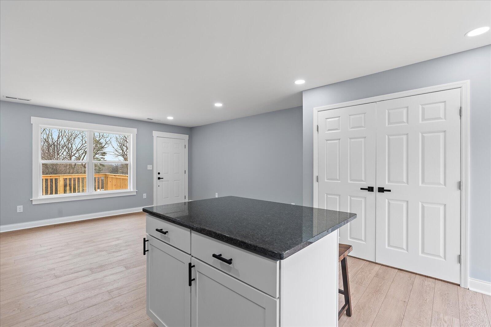 1917 Cir Drive Southwest Cleveland, TN 37311 - Photo 13 of 25 an empty room with wooden floor and window