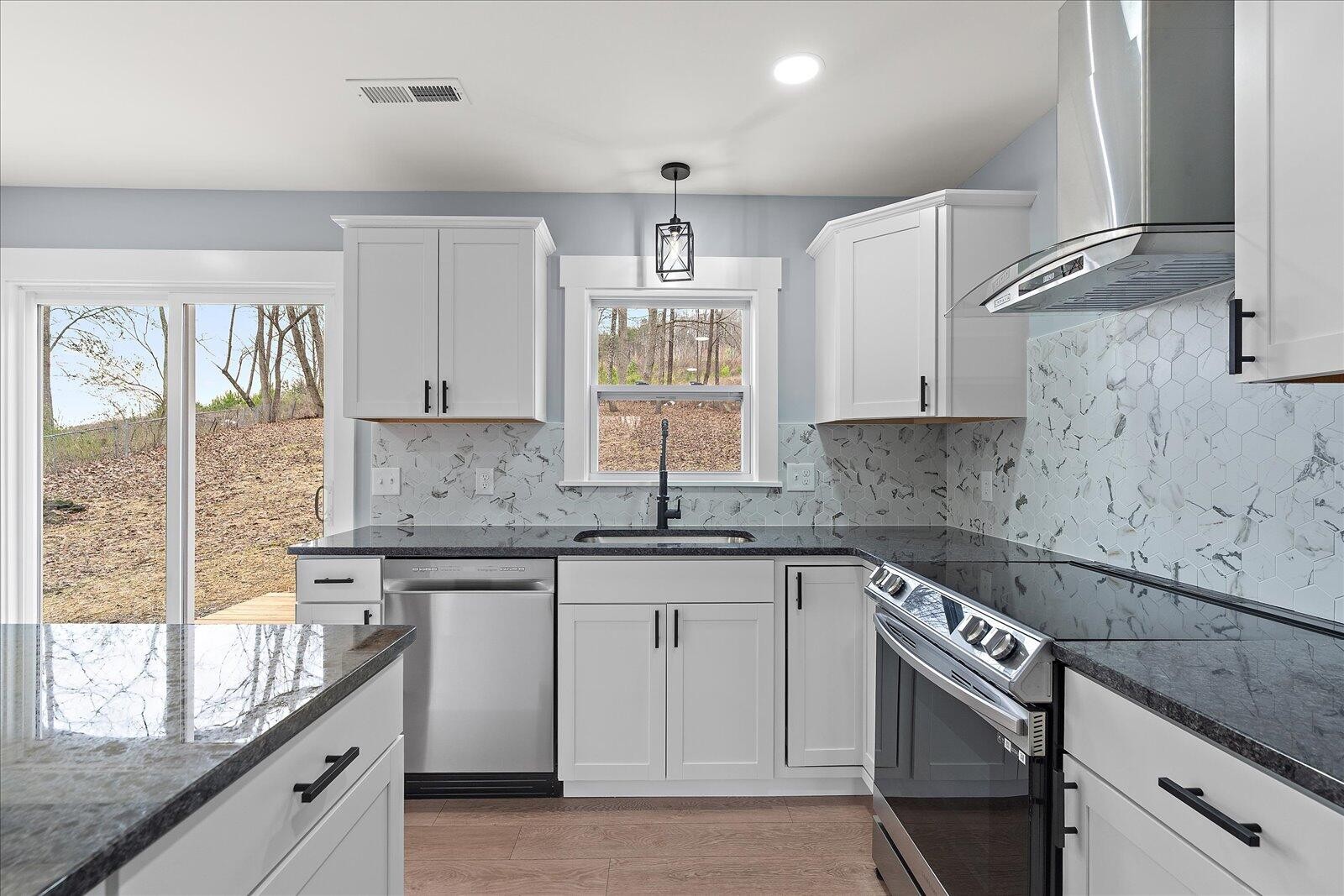 1917 Cir Drive Southwest Cleveland, TN 37311 - Photo 10 of 25 a kitchen with cabinets appliances a sink and a window