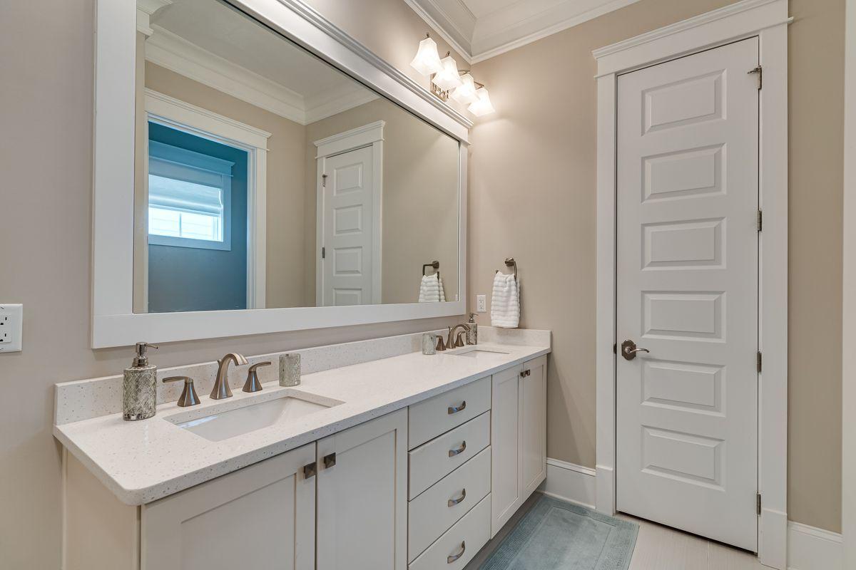 36 Clipper Street Inlet Beach, FL 32461 - Photo 19 of 44 a bathroom with a sink and a mirror