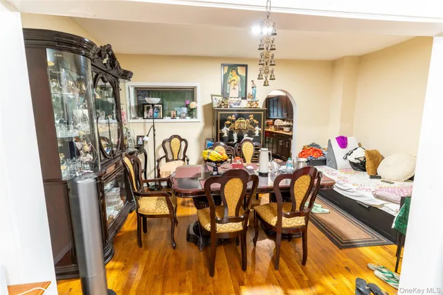 a kitchen with stainless steel appliances granite countertop a refrigerator a stove and a sink