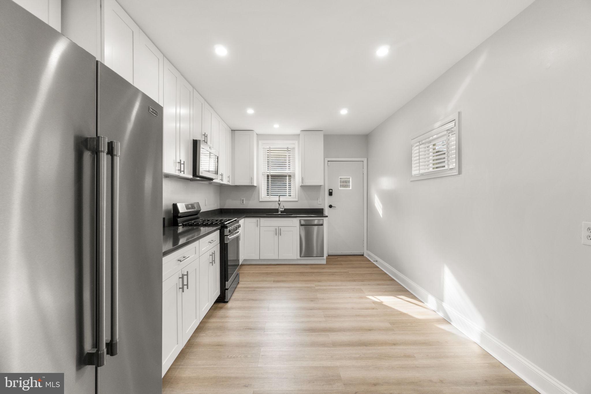 1827 Bank Street Baltimore, MD 21231 - Photo 10 of 31 Modern kitchen with sleek finishes.