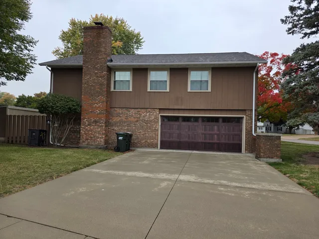 a front view of a house with yard