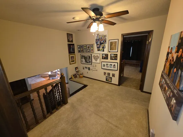 a bedroom with a bed and a mirror