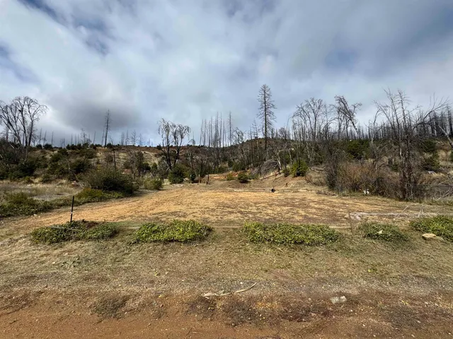 a view of swimming pool of water with mountain view