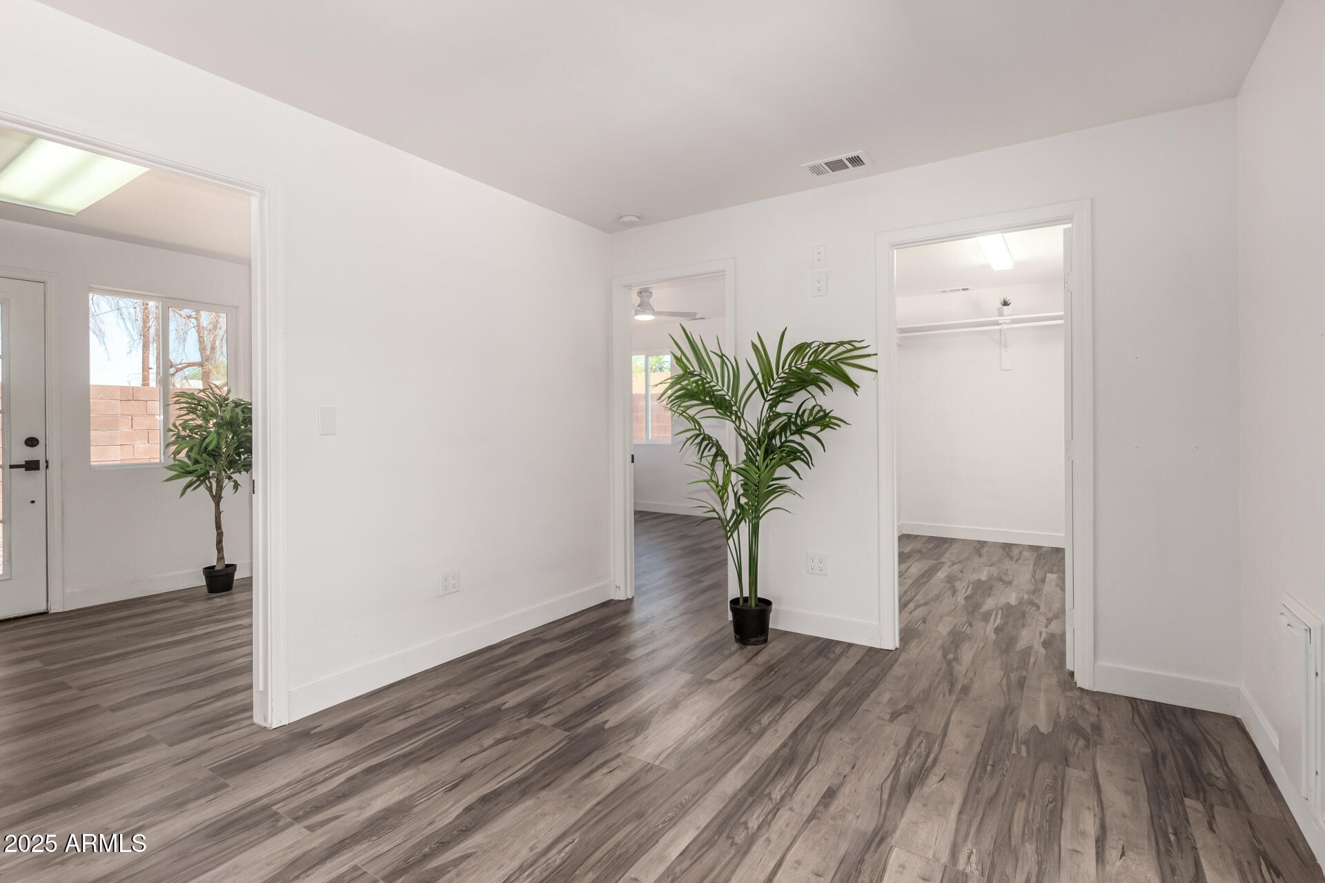 39 North Maple Mesa, AZ 85205 - Photo 24 of 29 a view of a hallway with wooden floor and plant