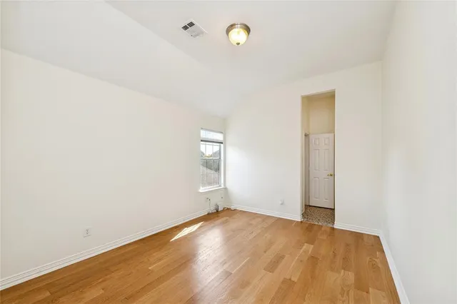a view of a house with backyard porch and sitting area