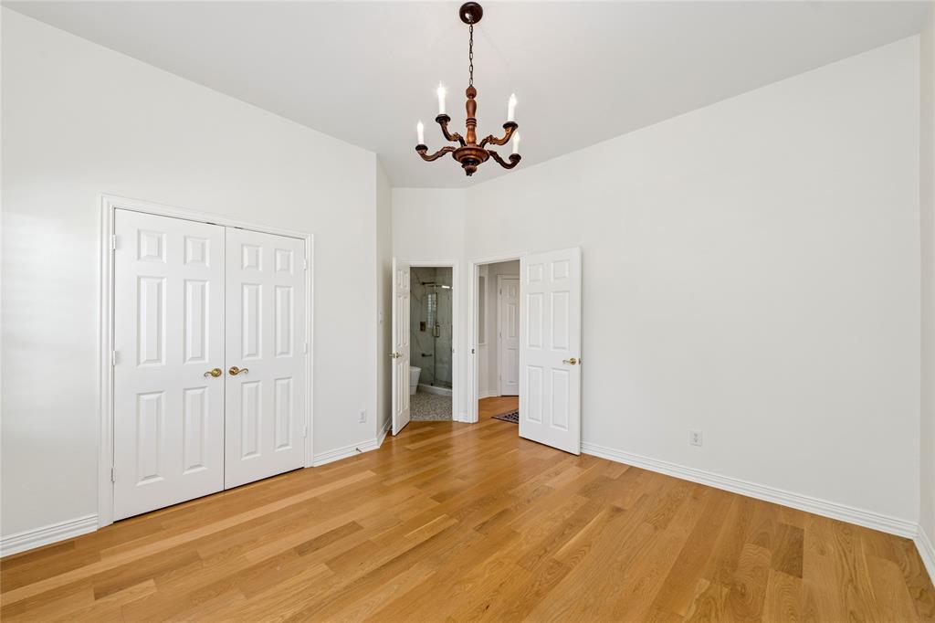 2107 Spindletop Trail Frisco, TX 75033 - Photo 33 of 39 a view of a chandelier fan and entryway