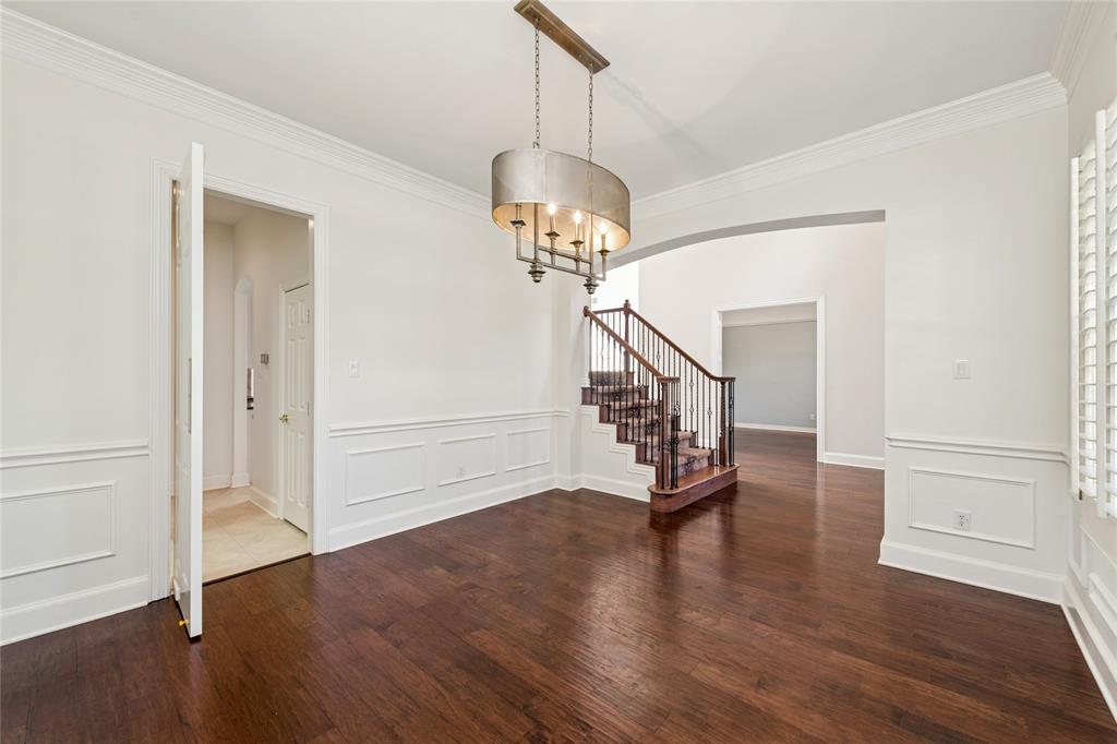 2107 Spindletop Trail Frisco, TX 75033 - Photo 6 of 39 a view of entryway with wooden floor