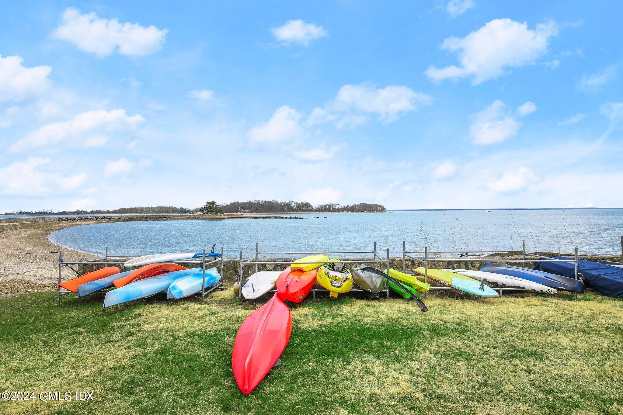 1 Seagate Road Riverside, CT 06878 - Photo 12 of 16 an aerial view of a house with swimming pool and furniture