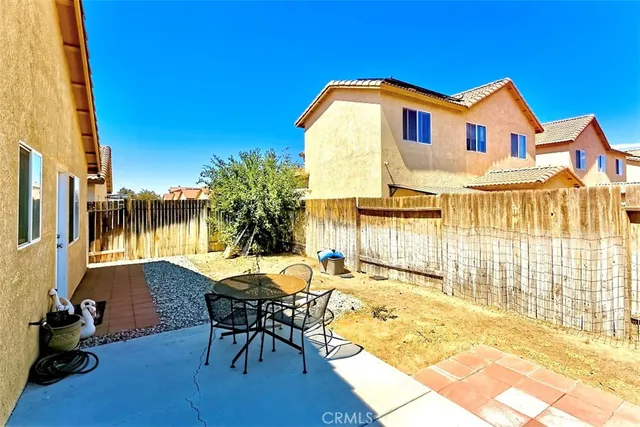 a view of a house with a patio