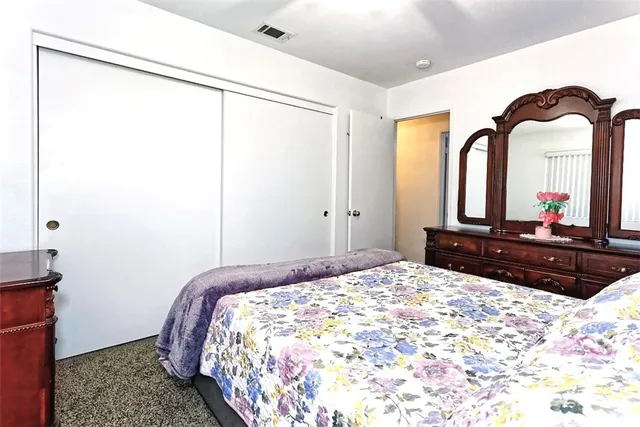 a bathroom with a sink toilet and mirror
