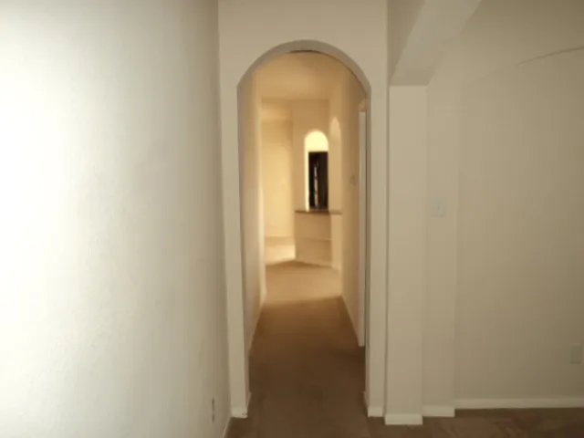 a kitchen with a sink and a stove