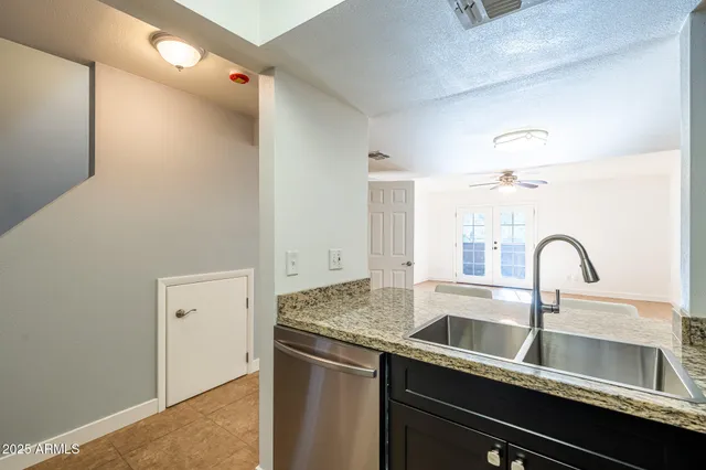 a bathroom with a sink and mirror
