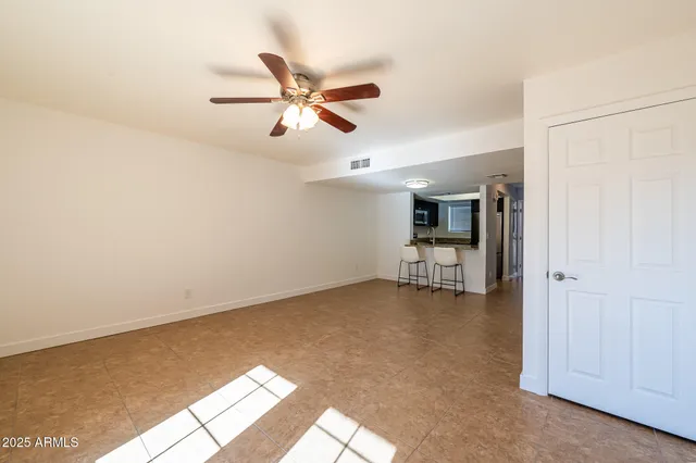 a view of an empty room with window