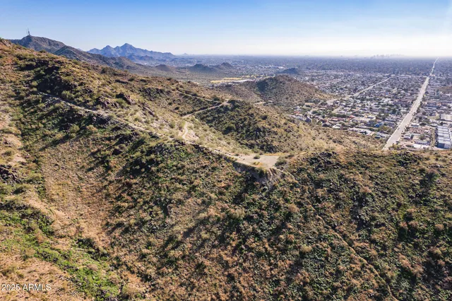 a view of a mountain from a balcony