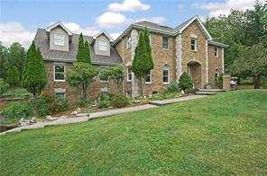 306 Rye Hill Road Monroe, NY 10950 - Photo 1 of 1 a front view of a house with a yard