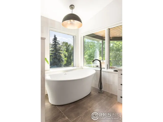 a view of a bathtub in a room