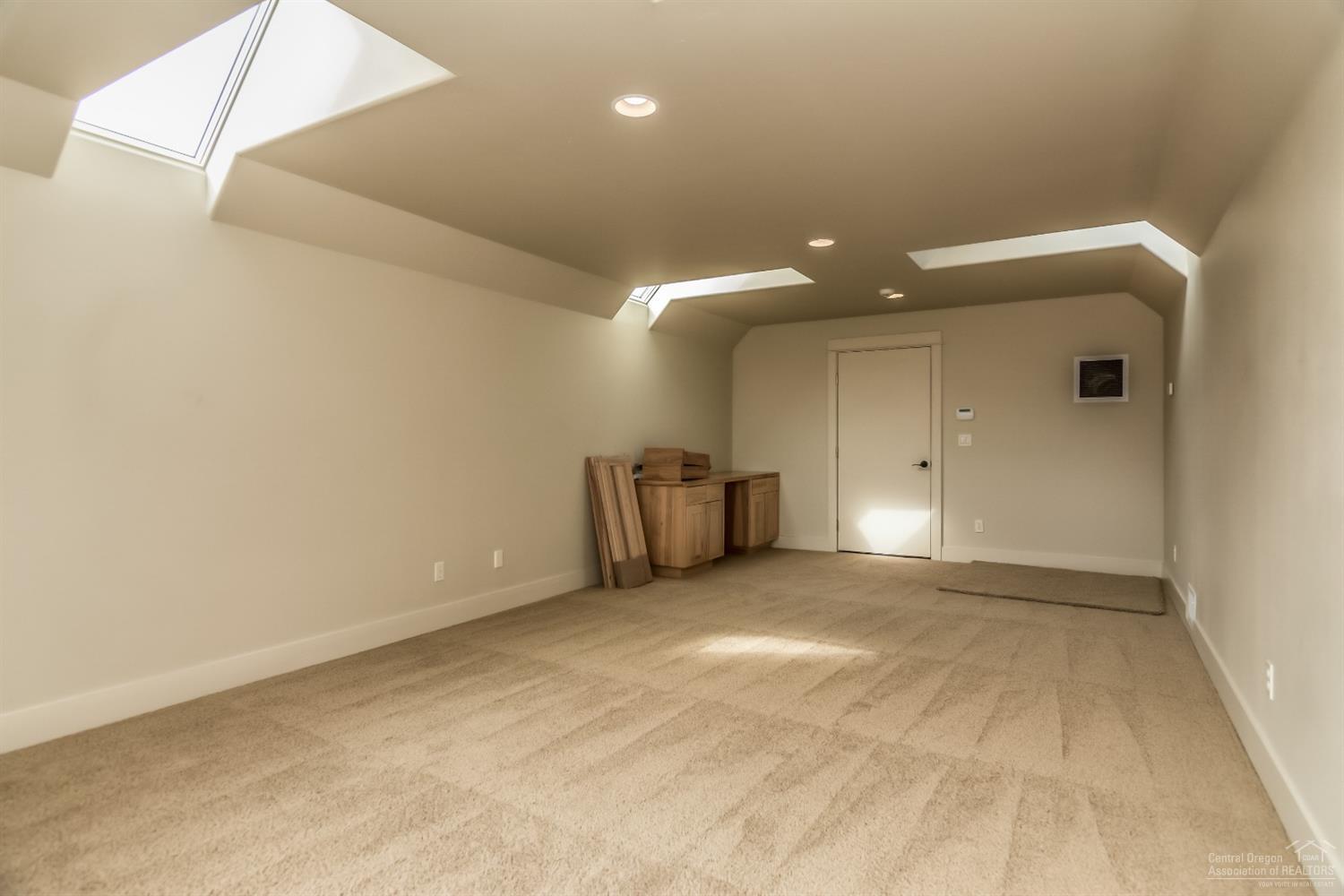 16794 Southwest Cronin Road Powell Butte, OR 97753 - Photo 22 of 25 Bonus room above garage. 247 square feet