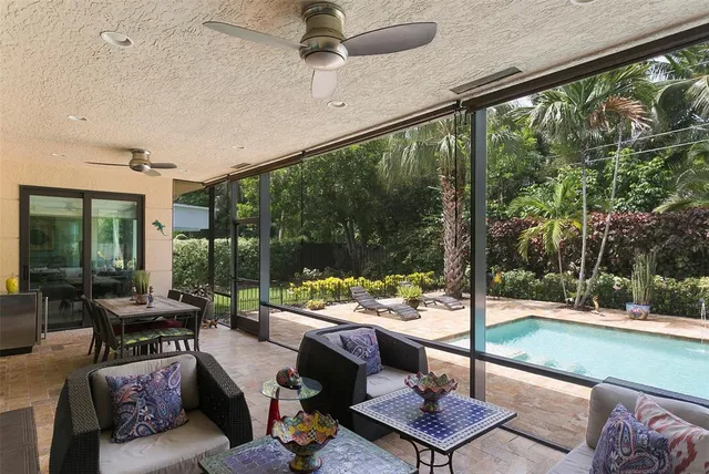 a outdoor space with patio the couches and a dining table with garden view