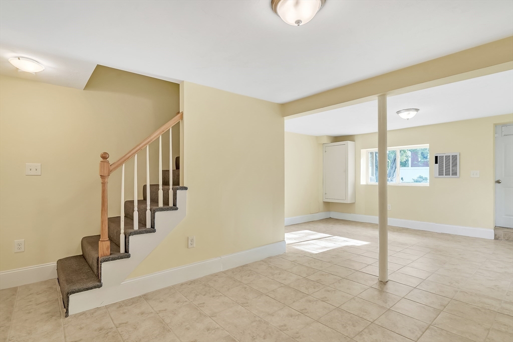 141 Renfrew Street Arlington, MA 02476 - Photo 35 of 41 a view of an entryway with staircase