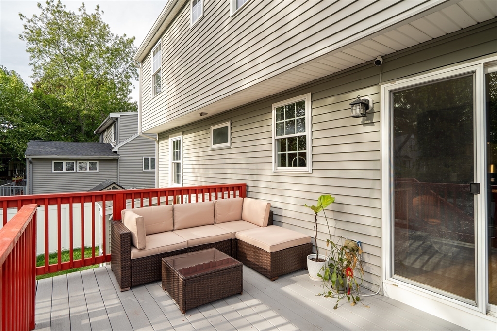 141 Renfrew Street Arlington, MA 02476 - Photo 37 of 41 a view of a two chairs in the balcony