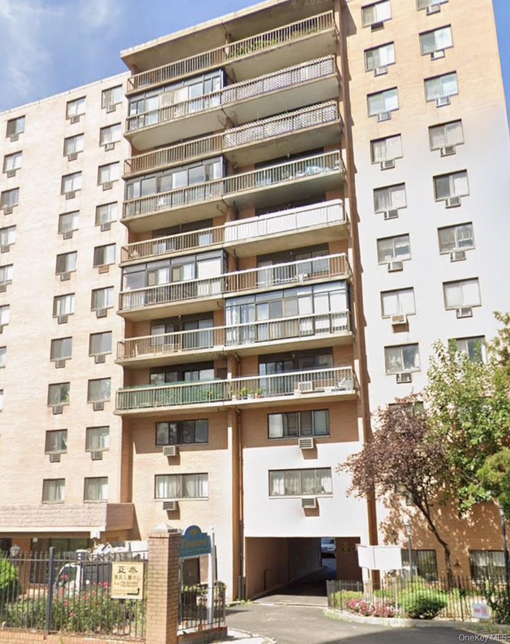 136-75 37th Avenue, Unit 10H Queens, NY 11354 - Photo 1 of 1 a view of a building