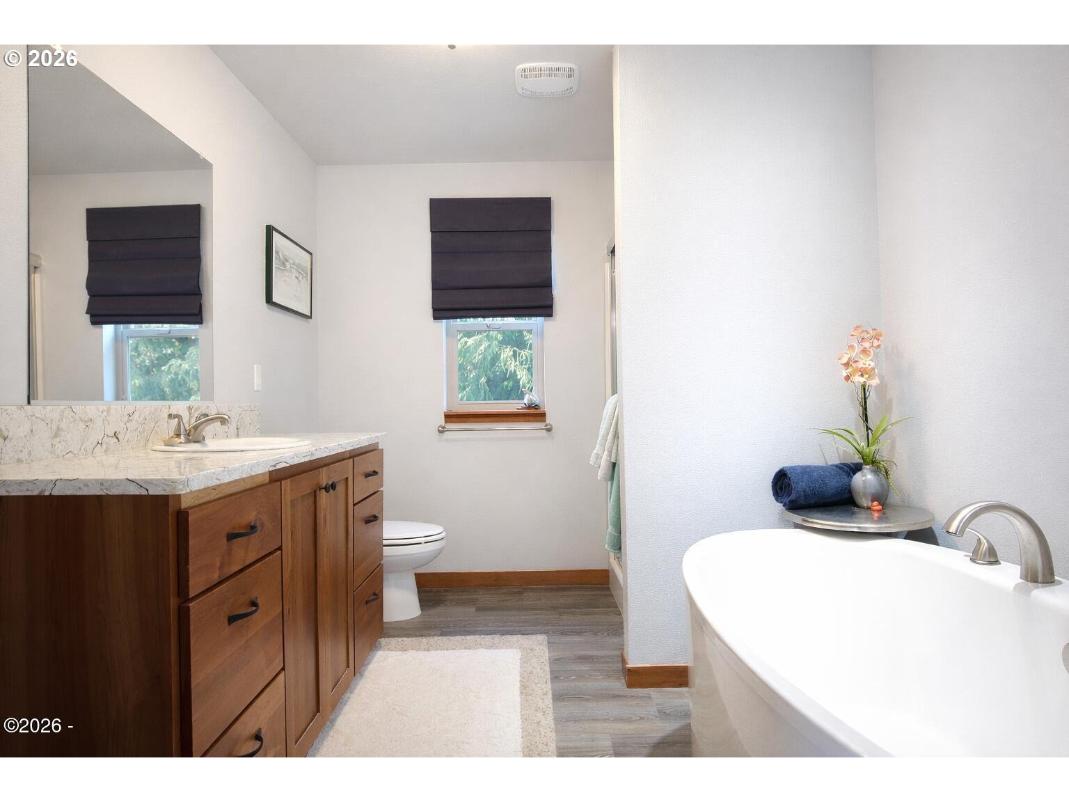 15 Shell Street Yachats, OR 97498 - Photo 19 of 47 a bathroom with a granite countertop sink and a mirror