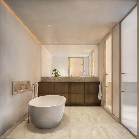 a bathroom with a bathtub and sink