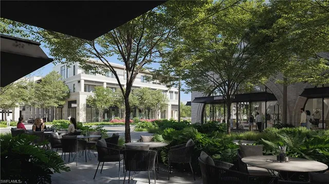 a view of a patio with couches table and chairs and potted plants