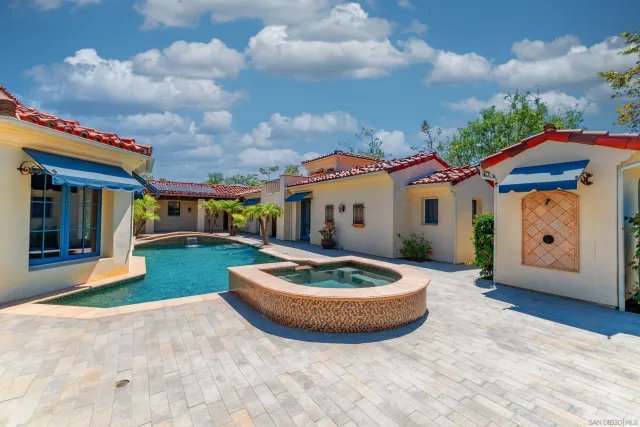 a view of a patio with a yard