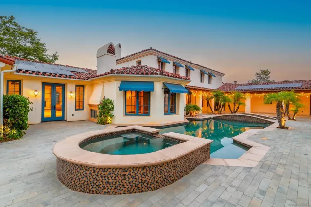 a view of a patio with a yard