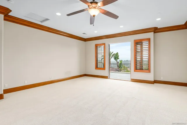a kitchen with granite countertop cabinets and outdoor space