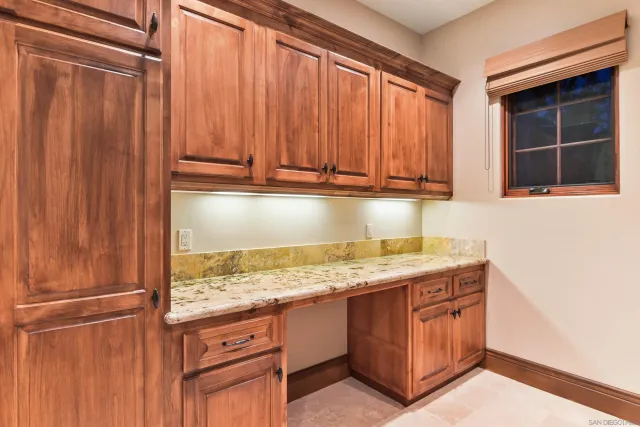 a picture of a bathroom with a shower