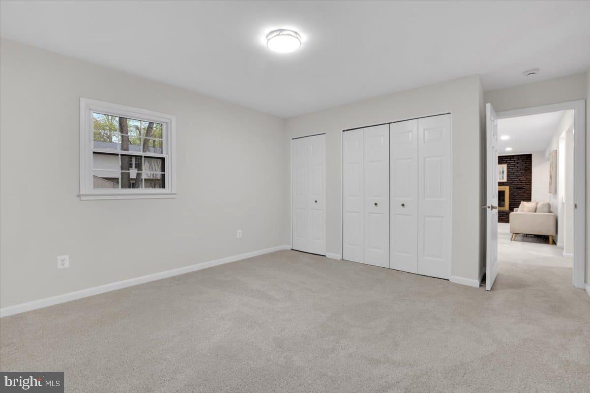 7217 Willow Oak Place Springfield, VA 22153 - Photo 24 of 31 a view of an empty room with a window