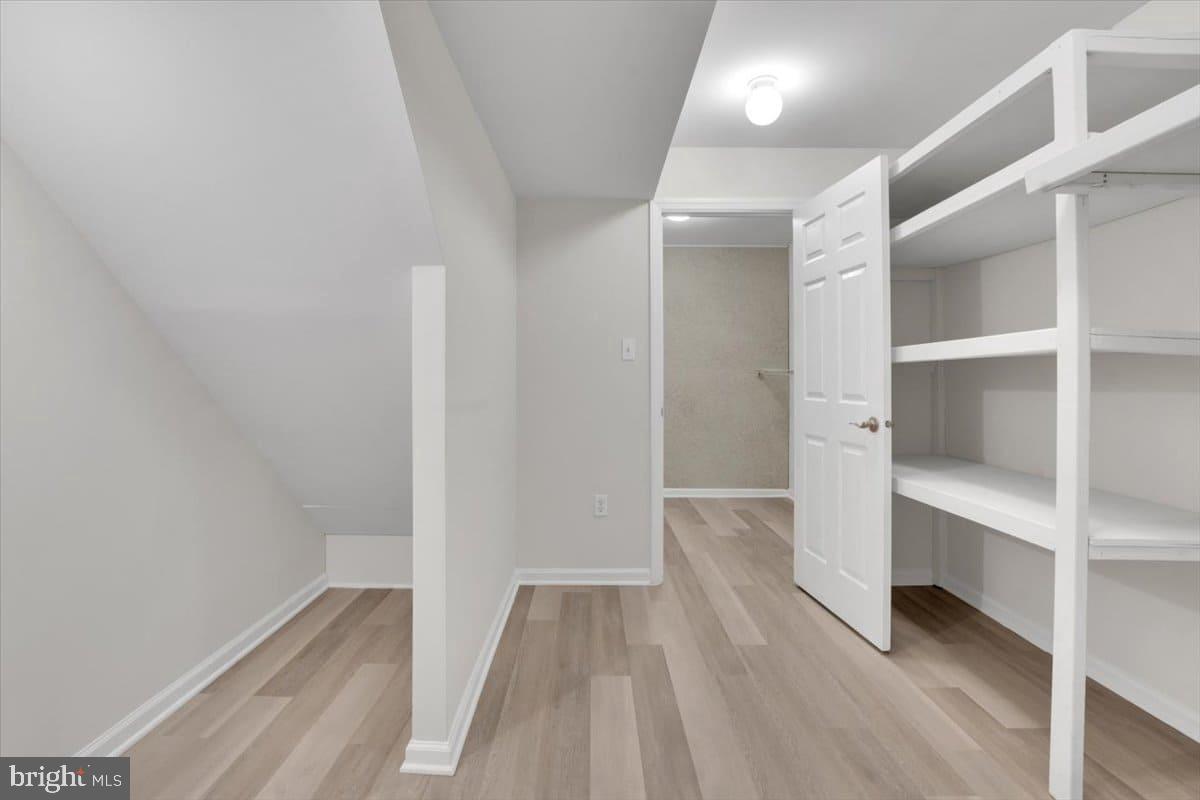 7217 Willow Oak Place Springfield, VA 22153 - Photo 25 of 31 a view of walk in closet with empty racks