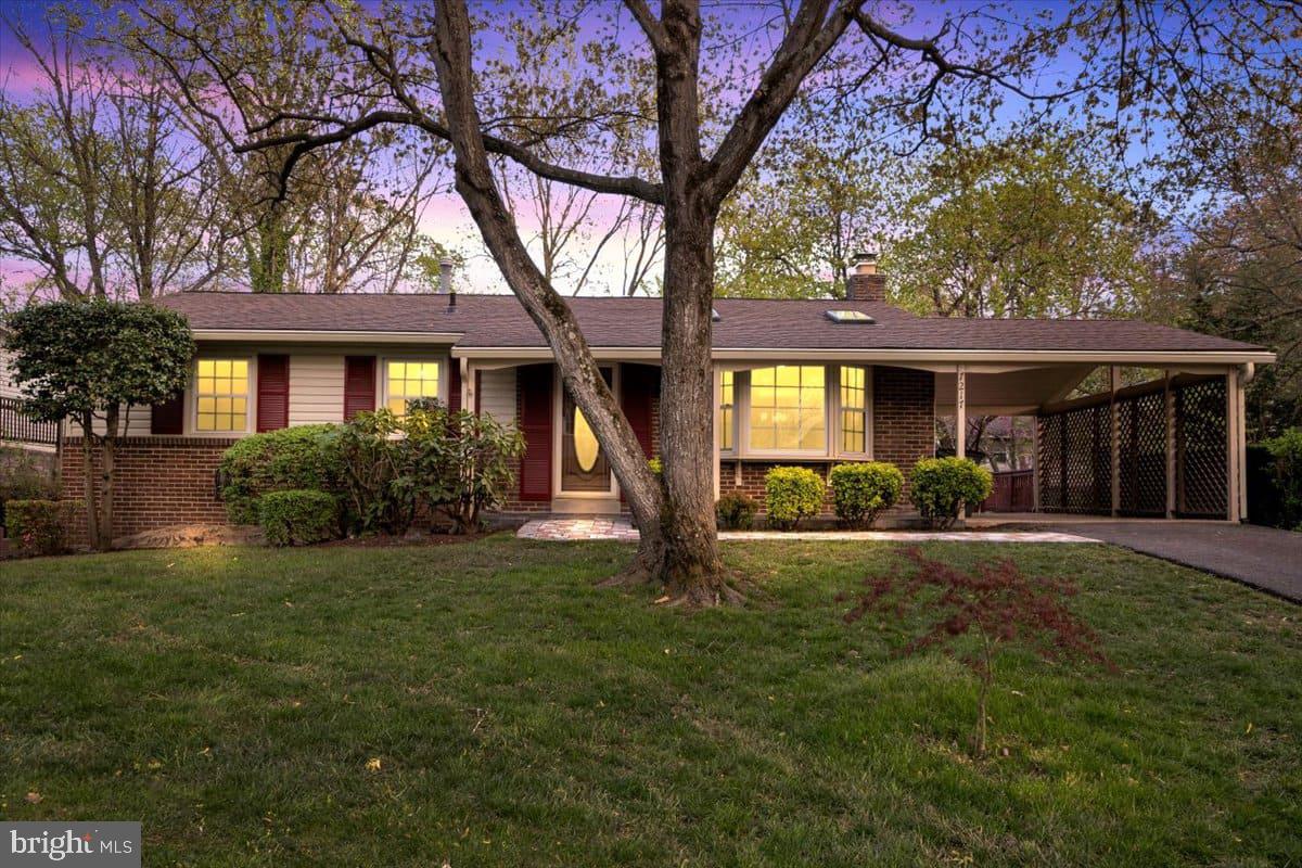 7217 Willow Oak Place Springfield, VA 22153 - Photo 31 of 31 a front view of a house with yard and green space