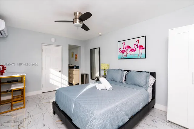 a living room with furniture and a chair