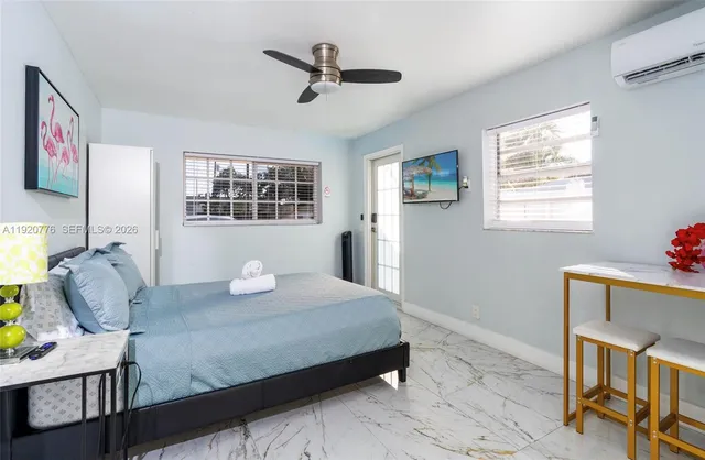 a bathroom with a sink and a shower