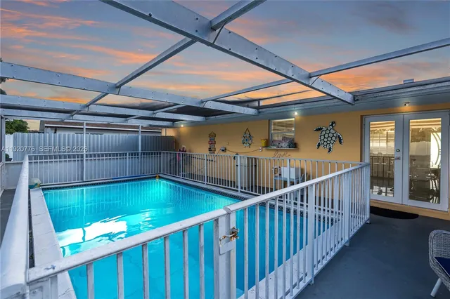 a view of balcony with wooden floor