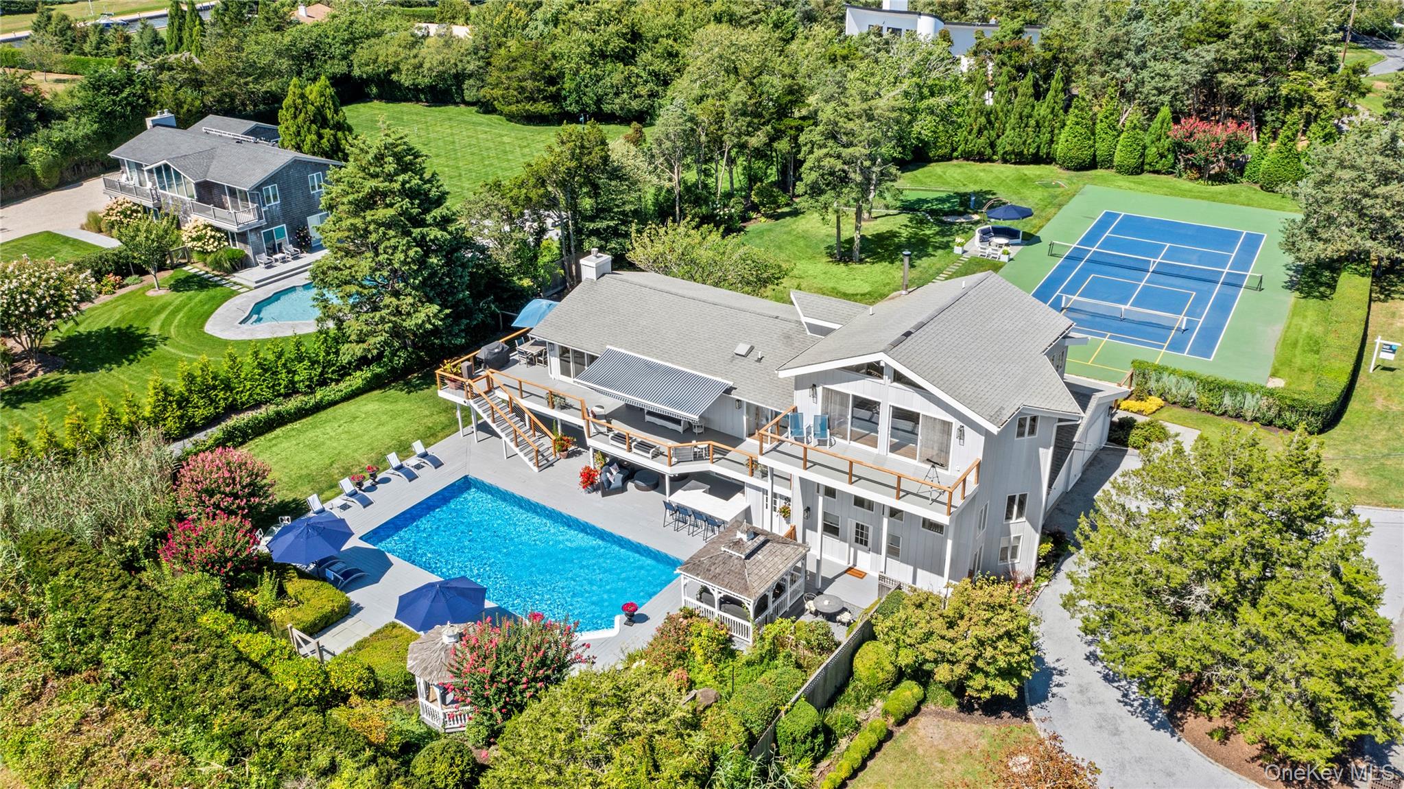 an aerial view of a house with a garden