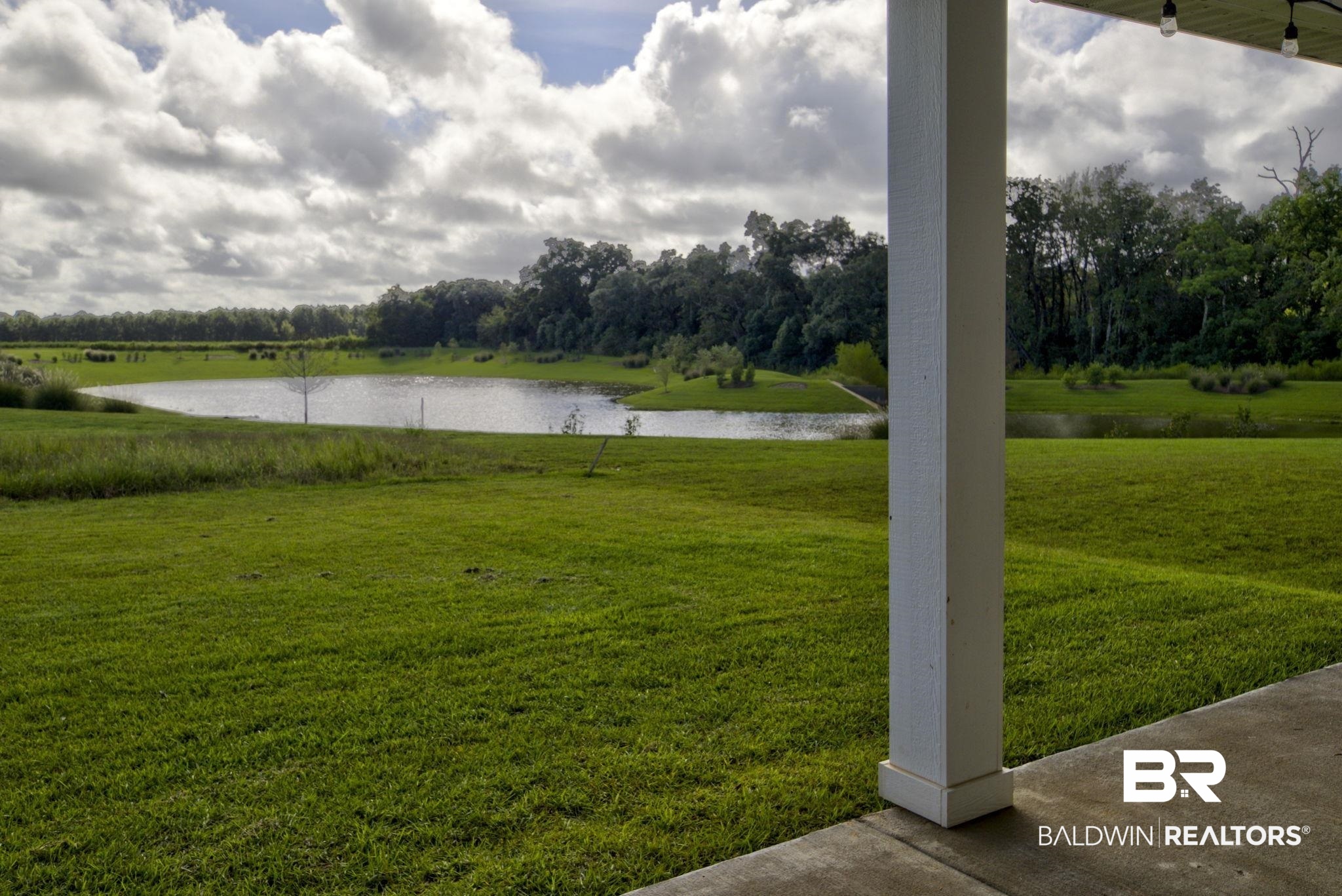 23810 Unbridled Loop Daphne, AL 36526 - Photo 3 of 50 View of yard with a water view