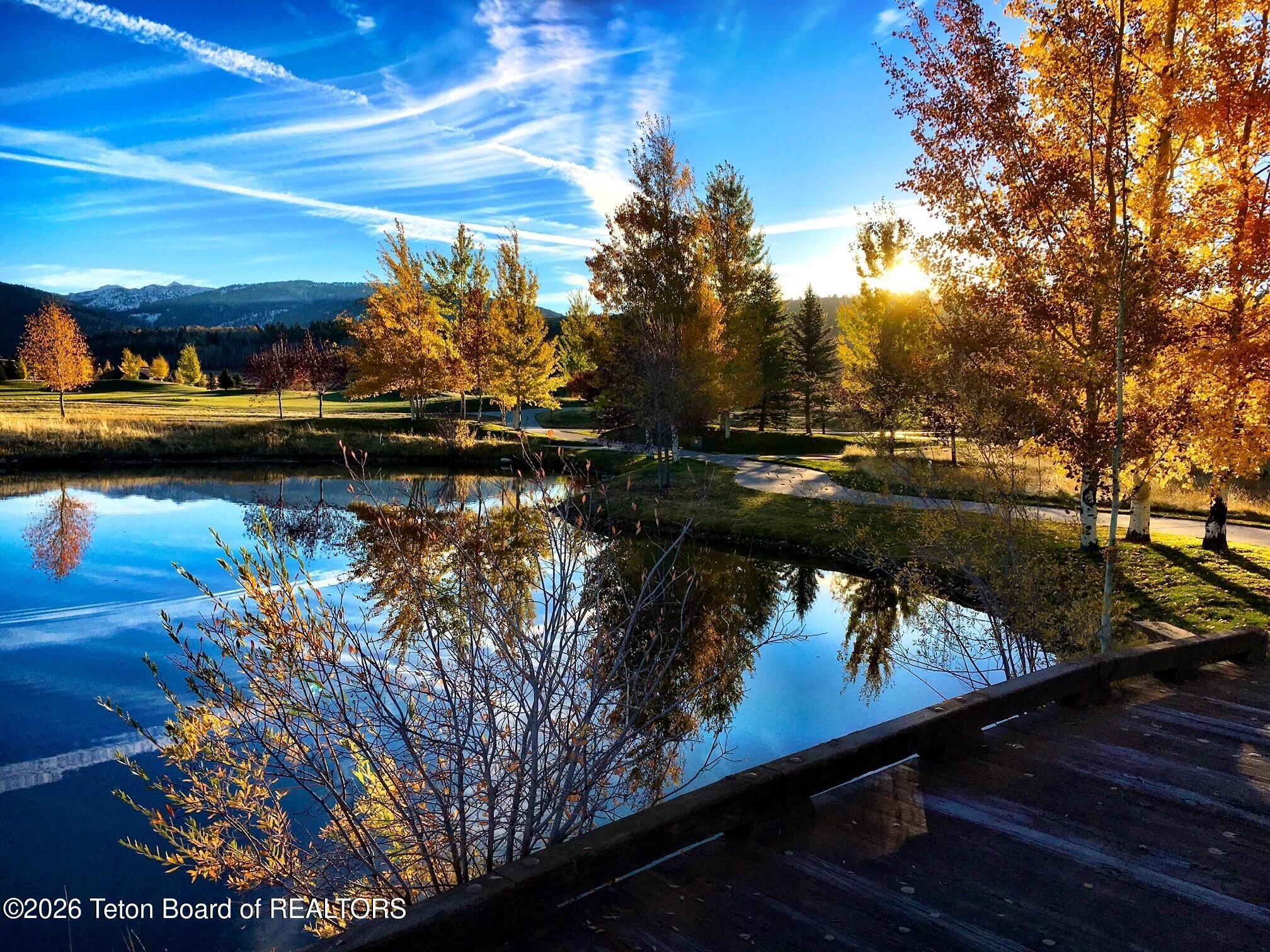 31 Bannock Circle Victor, ID 83455 - Photo 31 of 42 lodge home fall blue sky reflections ove