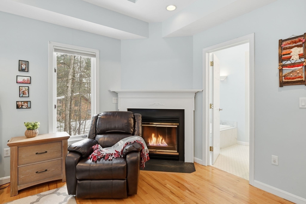 6 Shattuck Road Hadley, MA 01035 - Photo 21 of 40 a living room with furniture and a fireplace