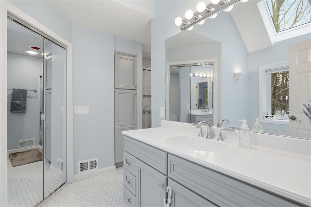 6 Shattuck Road Hadley, MA 01035 - Photo 22 of 40 a bathroom with a sink double vanity and a mirror